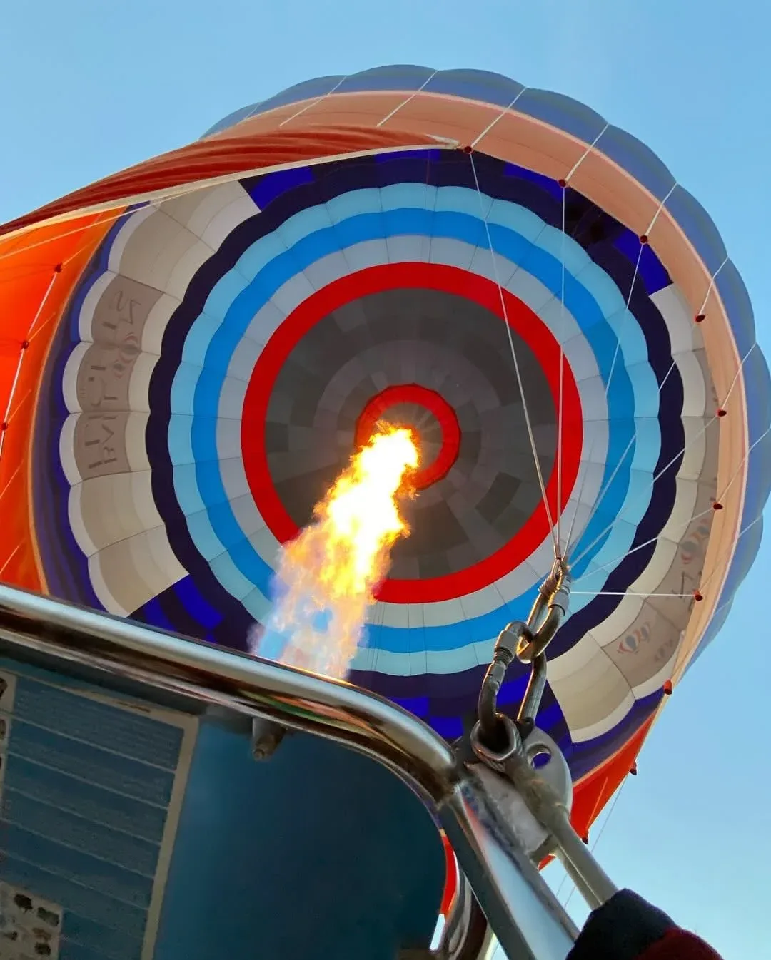 Hot air balloon burner flame during takeoff in Dubai desert