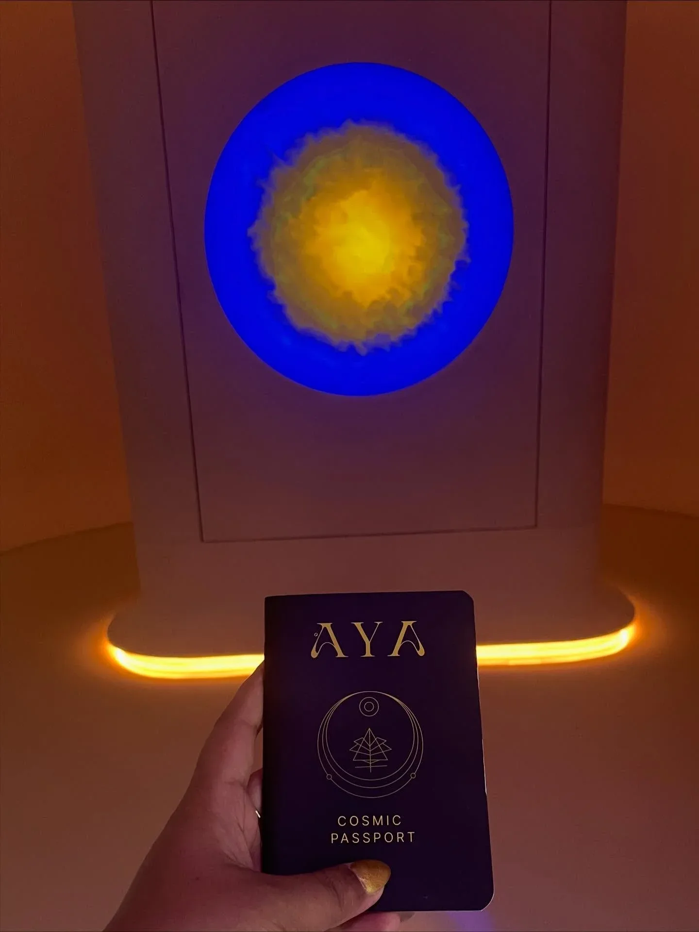 AYA Universe Dubai Cosmic Passport at an interactive illuminated art installation