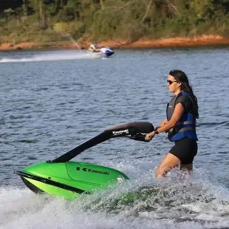 Woman riding a jet ski during a Dubai water sports adventure