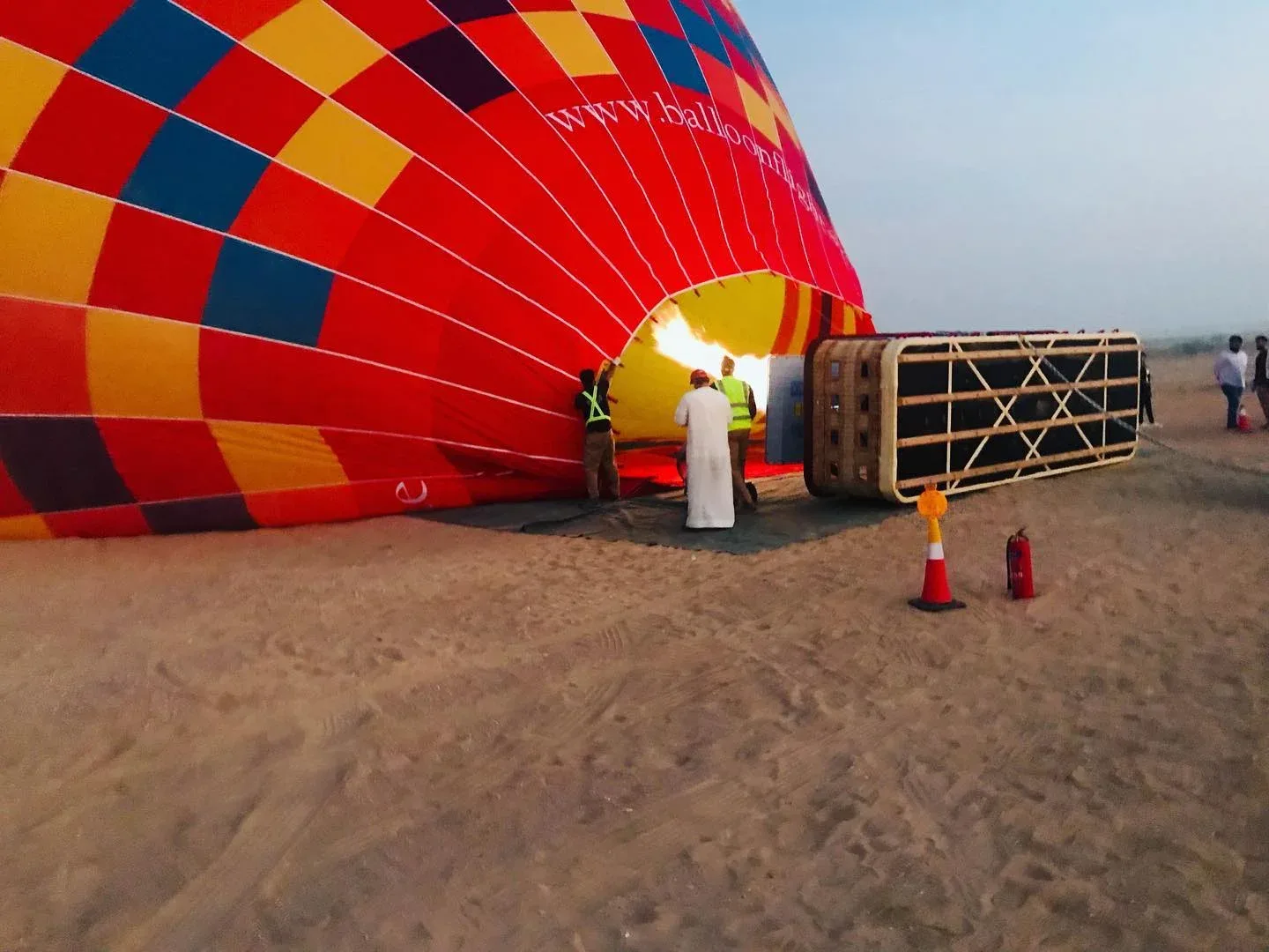 Hot air balloon being inflated on the Dubai desert before flight