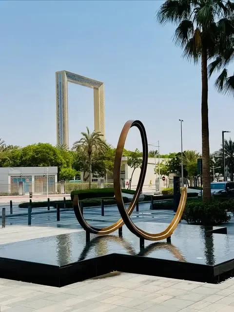 Dubai Frame viewed from Zabeel Park with landscaped surroundings
