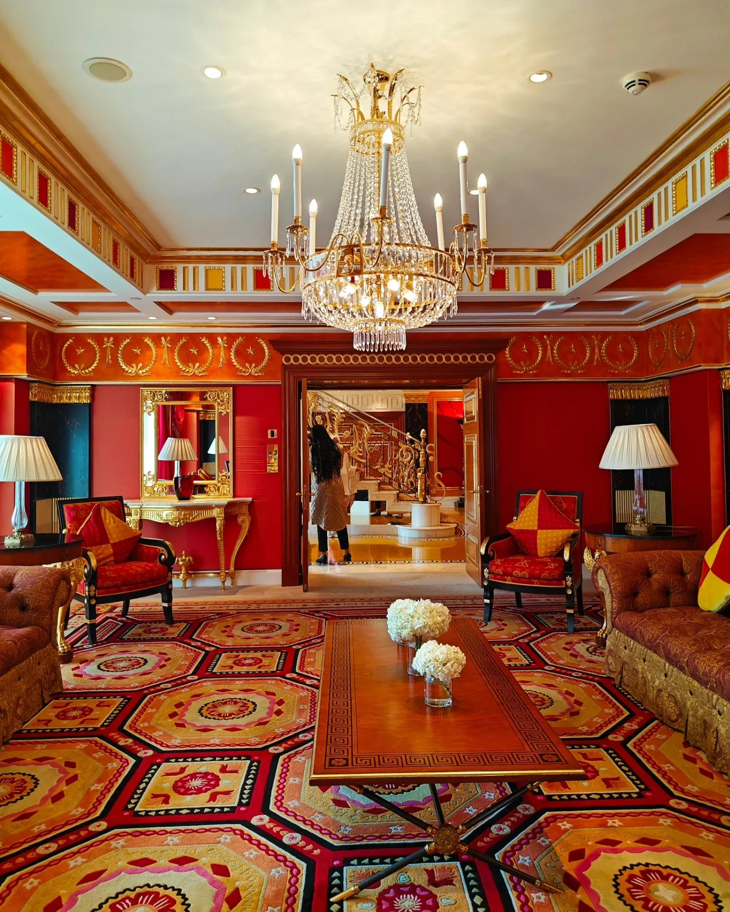 Luxury red and gold interior inside Burj Al Arab Dubai