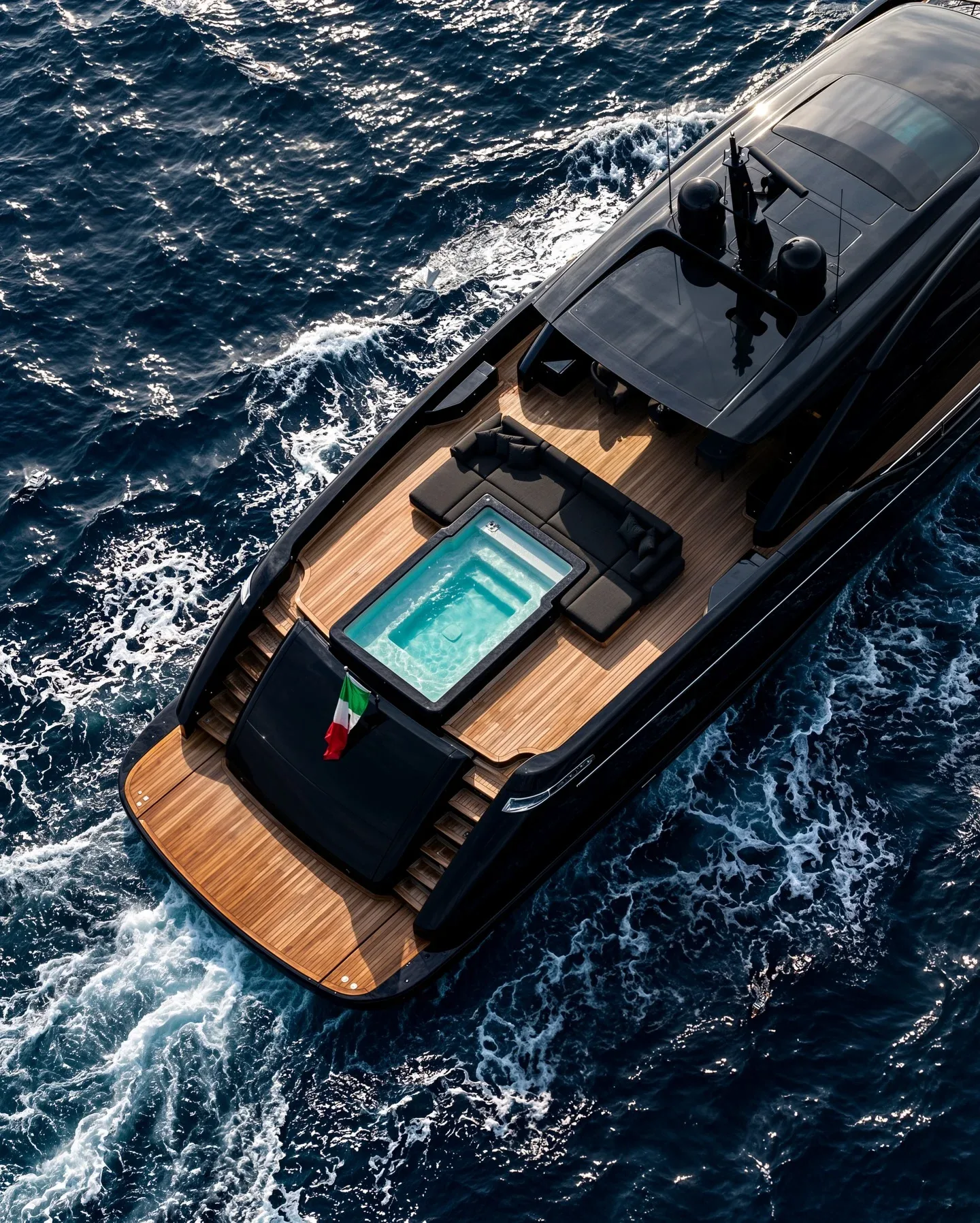 Black Boat Tours luxury boat viewed from above on open water
