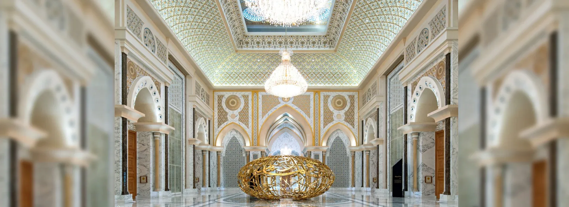 Ornate interior of Qasr Al Watan Abu Dhabi with decorative walls and grand chandelier