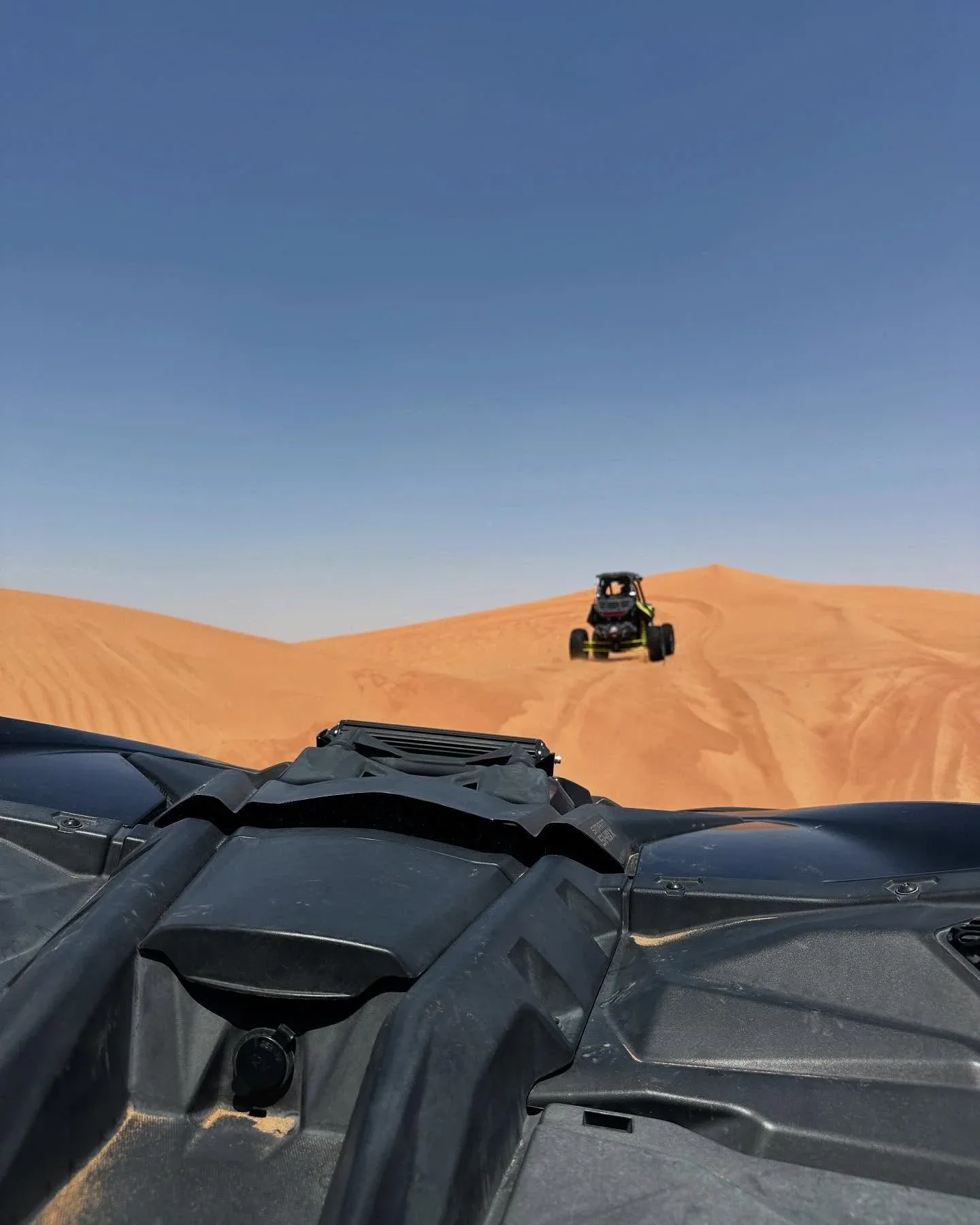 Can-Am Maverick buggy tour through the golden dunes of Dubai desert