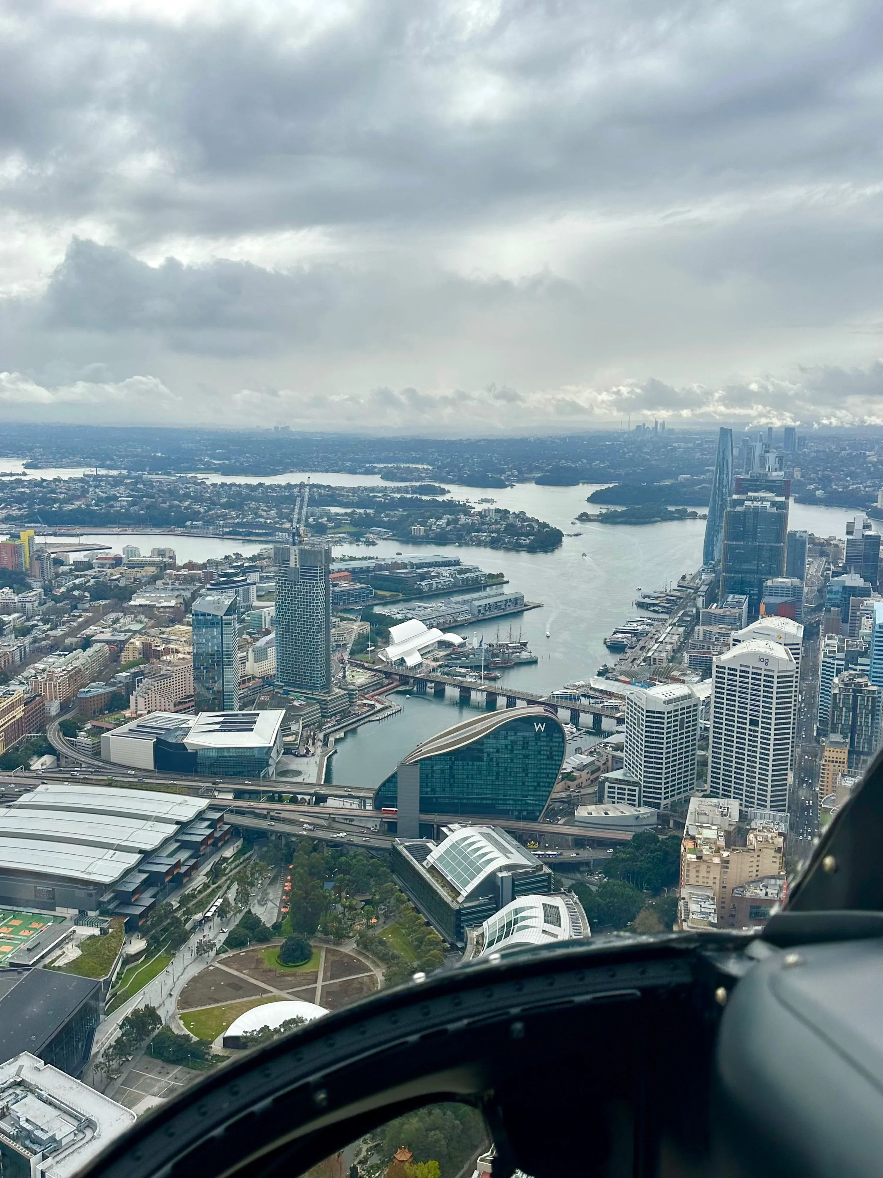 Aerial view of a city coastline from a helicopter tour