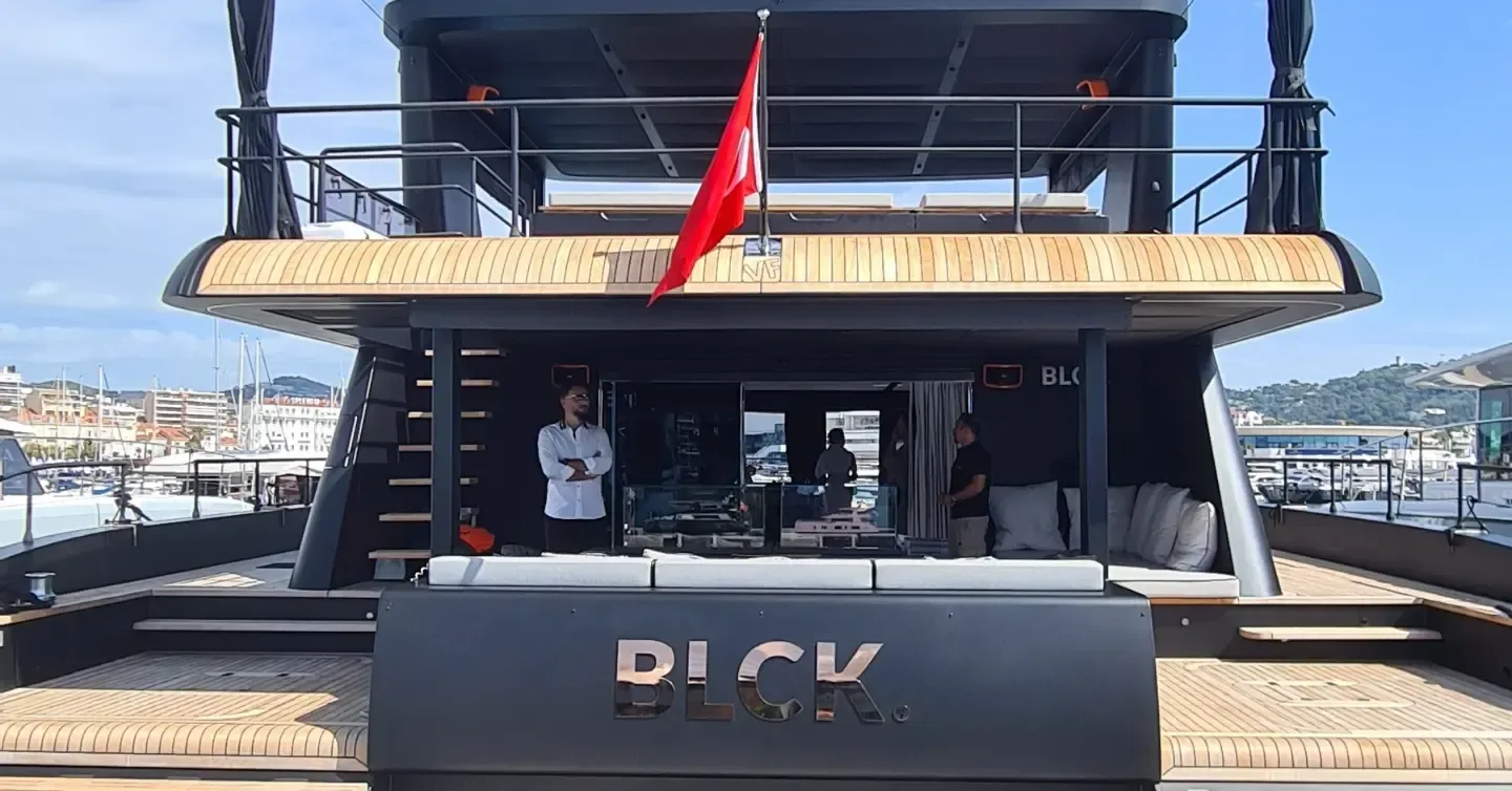 Black Boat Tours luxury boat deck and seating area at the marina