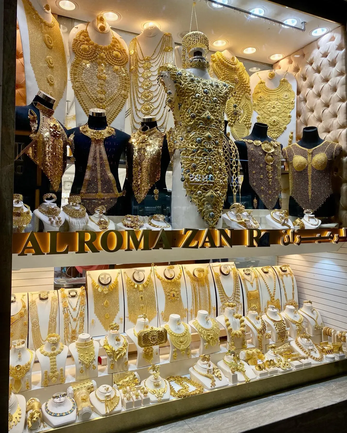 Luxury gold jewellery collection displayed in a Dubai jewellery shop window