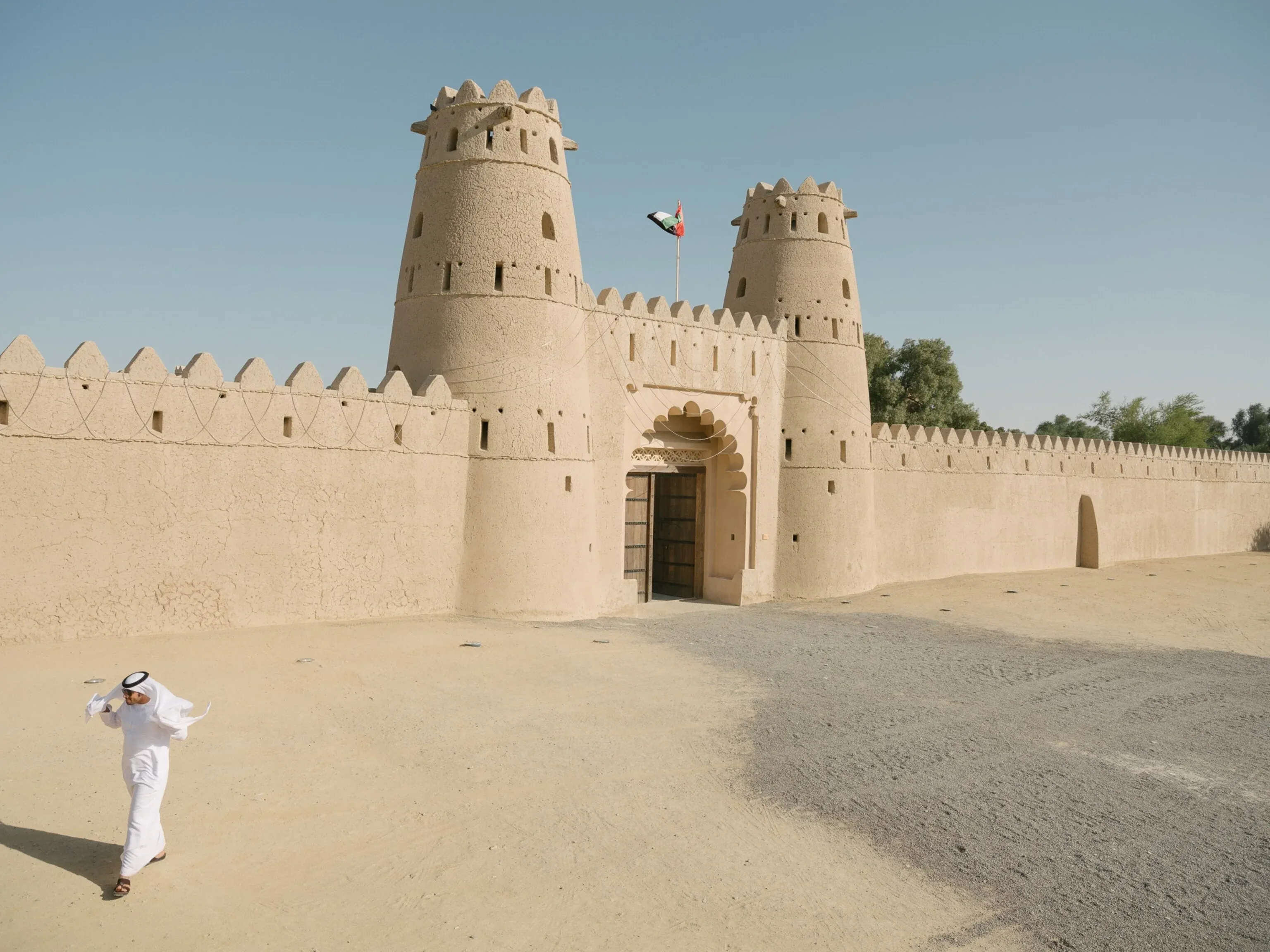 Traditional UAE heritage fort with watchtowers and historic architecture in Abu Dhabi
