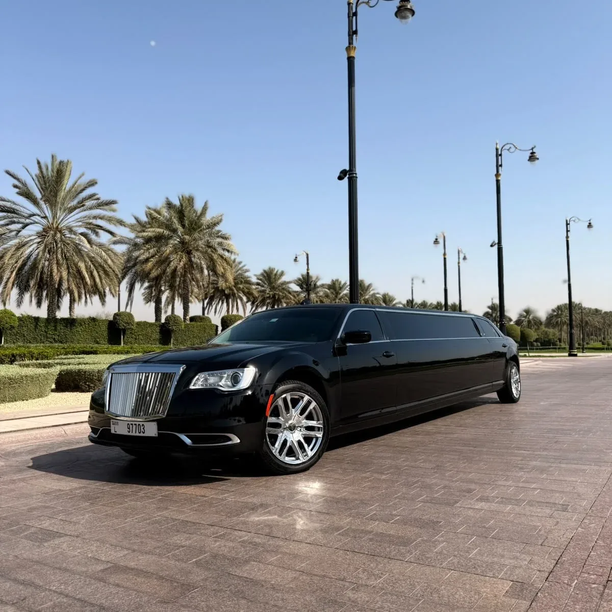 Luxury black limousine parked outdoors in Dubai
